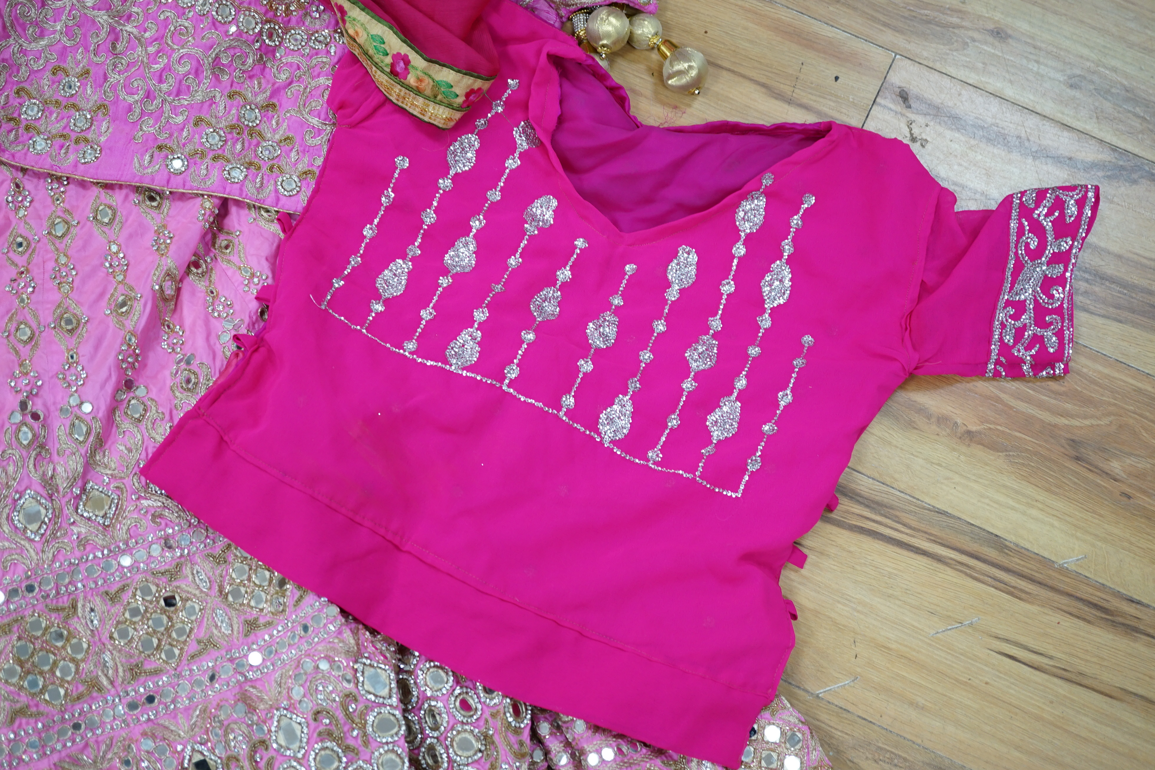 A collection of Indian silk saris and costume possibly bridal